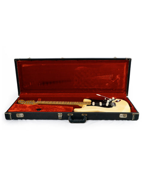 Vintage Fender Telecaster electric guitar from 1976, securely stored in a case, ready for performance or display.