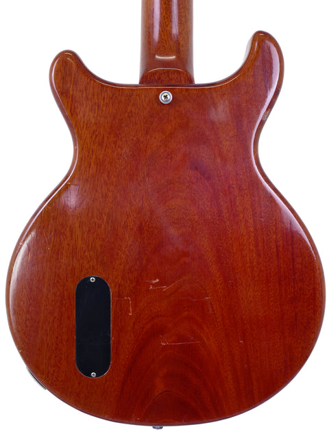 Vintage Gibson Les Paul Jr from 1959, showcasing a wooden body and sleek black pickguard, perfect for collectors.