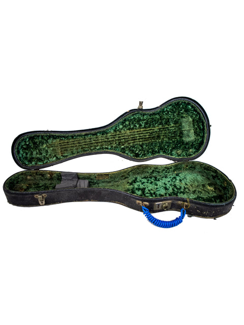 Vintage green guitar case with a blue handle, housing a 1930s Rickenbacher Electro Lap Steel from the USA.