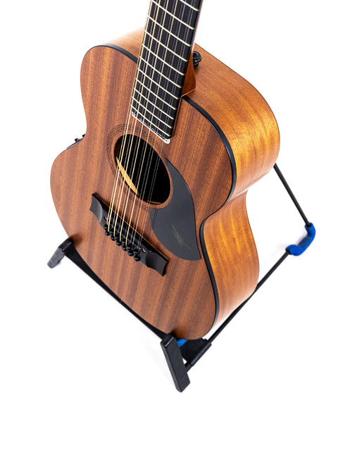 small Maton Mahogany Mini12 String acoustic guitar on a stand, showcasing its elegant design and craftsmanship from 2017.