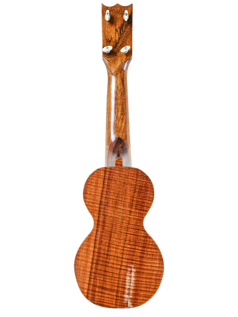1920s Kumalae ukulele with a beautifully crafted wooden body and neck, representing traditional Hawaiian music culture.
