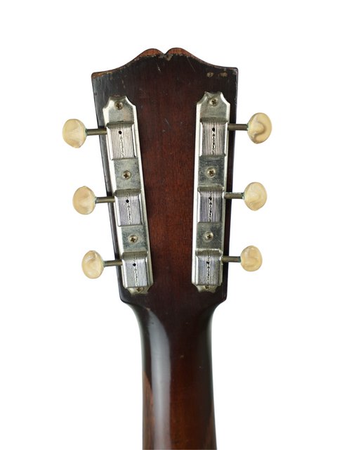 1930s Gibson Les Paul Custom, Kalamazoo KG-32, representing iconic vintage American guitar craftsmanship from 1938.
