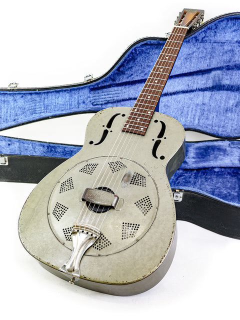 1936 National Duolian Resonator guitar resting in its case, showcased on a simple white background.