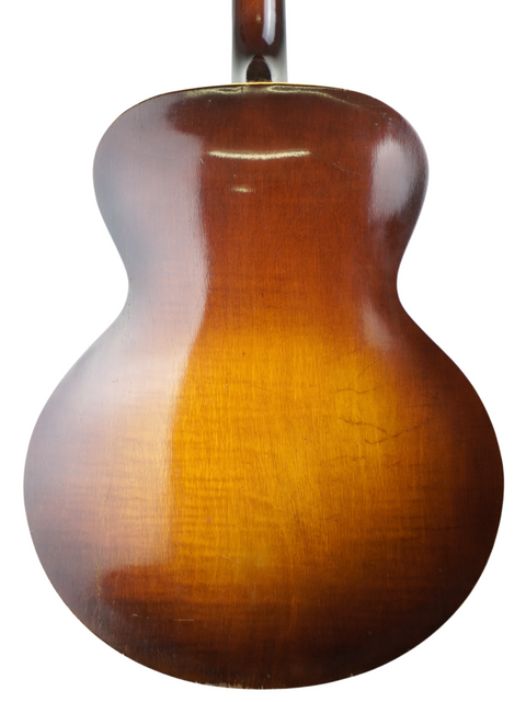 1951 Gibson ES-335 sunburst guitar, exemplifying vintage craftsmanship from Kalamazoo, USA, with a rich historical background.