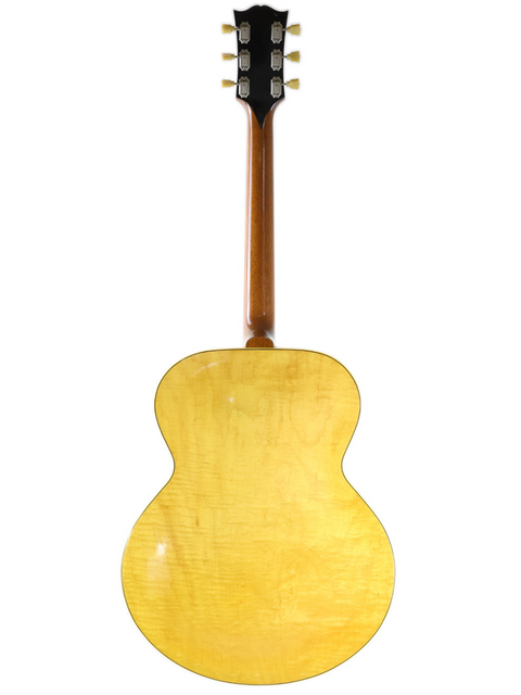 1952 Gibson ES-300 guitar in vibrant yellow, highlighting its wooden back and neck, a true vintage musical treasure.