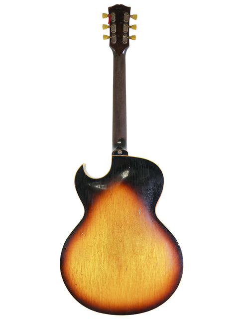 1962 Gibson ES-175D guitar in sunburst finish, accented by a black pickguard.