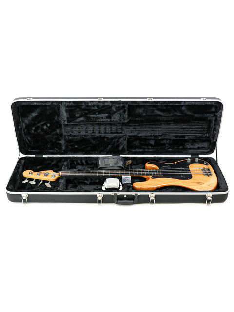 1963 Fender L-Series Precision Bass guitar displayed in a case, with a simple white background.