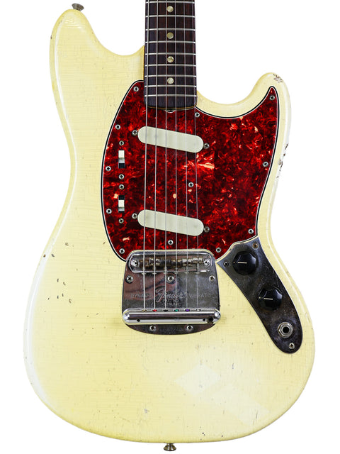 1967 USA Fender Mustang guitar, elegantly designed in white with vibrant red and black paint, perfect for rock enthusiasts.