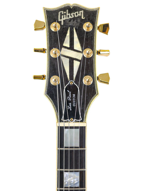 1991 Gibson Les Paul Custom Shop in black, highlighting its iconic shape and premium features.
