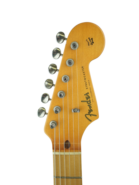 2005 Fender Eric Johnson Signature Stratocaster electric guitar, known for its iconic shape and vibrant color.