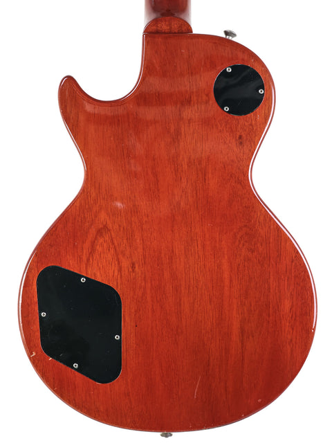 2009 Gibson Les Paul '59 Reissue guitar showcasing a wooden body and a stylish black headstock, made in the USA.