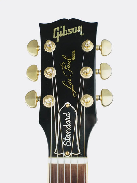 1995 Gibson Jimmy Page Signature Les Paul headstock with gold tuning pegs on a white background