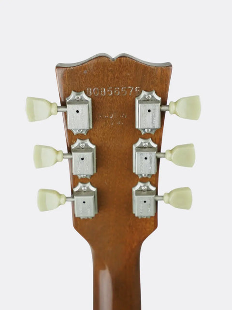 Close-up of a Gibson ES-175 headstock with tuning pegs on a white background
