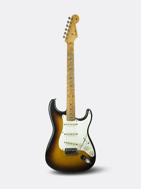 Fender Stratocaster - USA 1957 with a sunburst finish on a white background