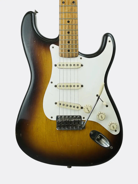 Fender Stratocaster - USA 1957 guitar with sunburst finish on a white background