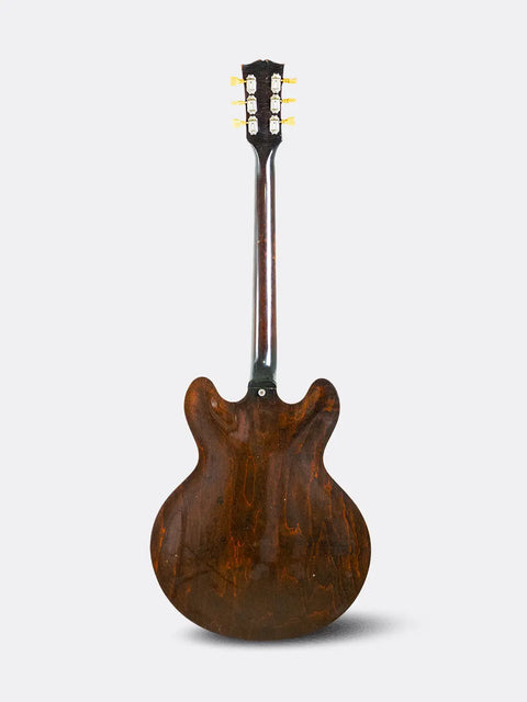 Gibson ES-335 with a brown finish on a white background