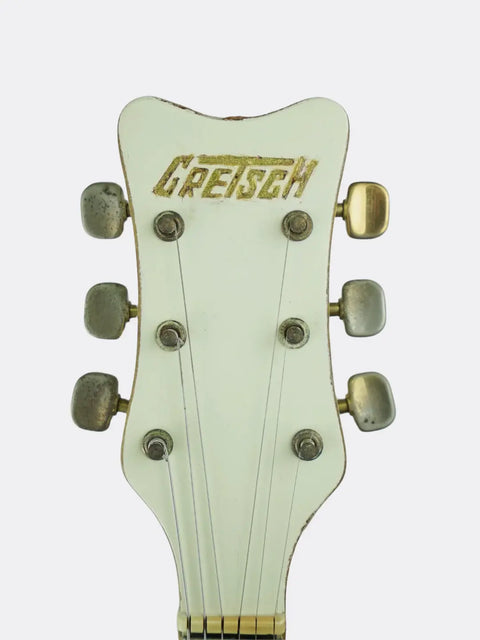 1972 Gretsch White Falcon headstock on a white background