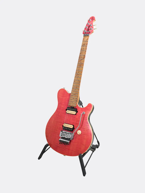 1992 Ernie Ball Music Man EVH Signature guitar on a stand against a white background