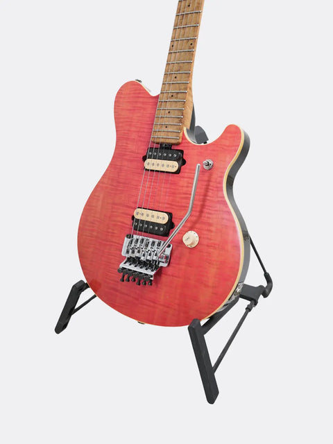 1992 Ernie Ball Music Man EVH Signature guitar on a stand against a light gray background