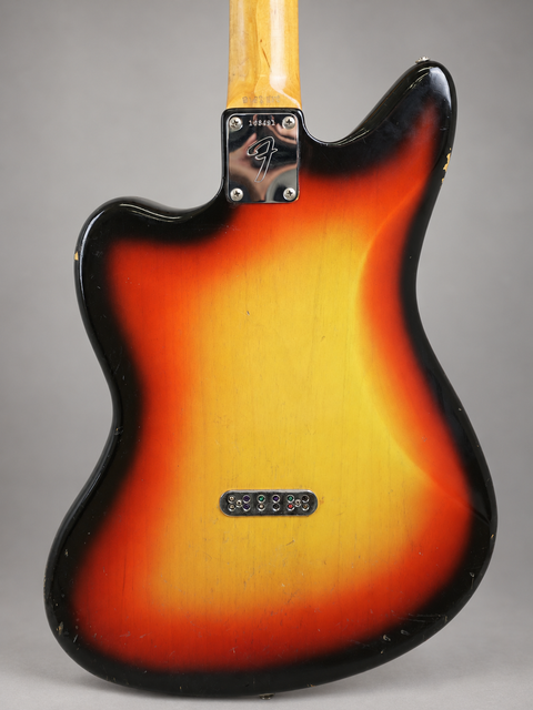 A beautiful 1965 Vintage Fender Electric XII guitar featuring a vibrant sunburst finish, perfect for any music lover.
