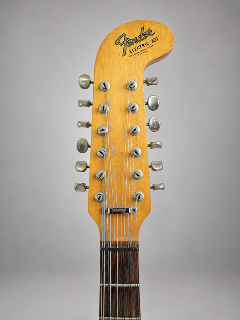  Vintage Fender Electric XII guitar from 1965 featured on a white background, showcasing its timeless design and elegance.