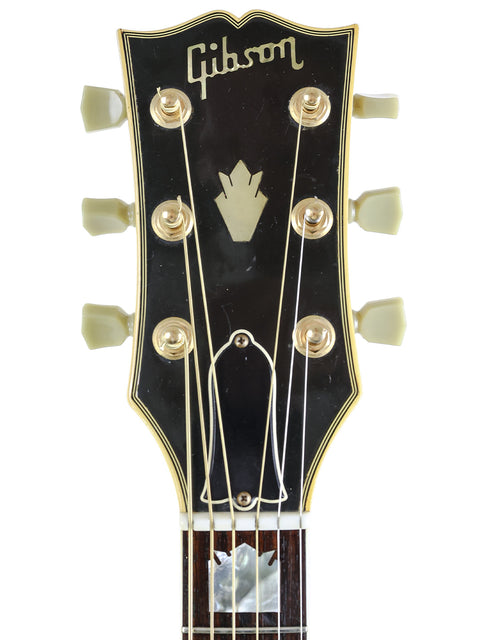 A 1984 Vintage Gibson Les Paul Custom Shop guitar, exemplifying classic design and superior craftsmanship.