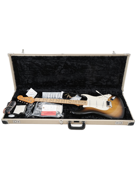 A 2005 Fender Eric Johnson Signature Stratocaster, highlighting its classic shape and vibrant color in a detailed view.