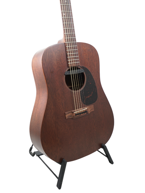 A 2014 Martin D-15M acoustic guitar resting on a stand, highlighting its elegant wooden craftsmanship.