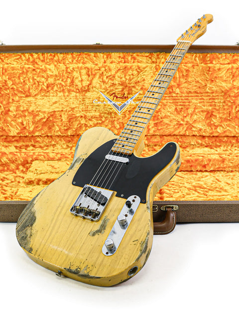A '53 Telecaster Heavy Relic guitar from Fender Custom Shop, resting in its case on a pristine white background.
