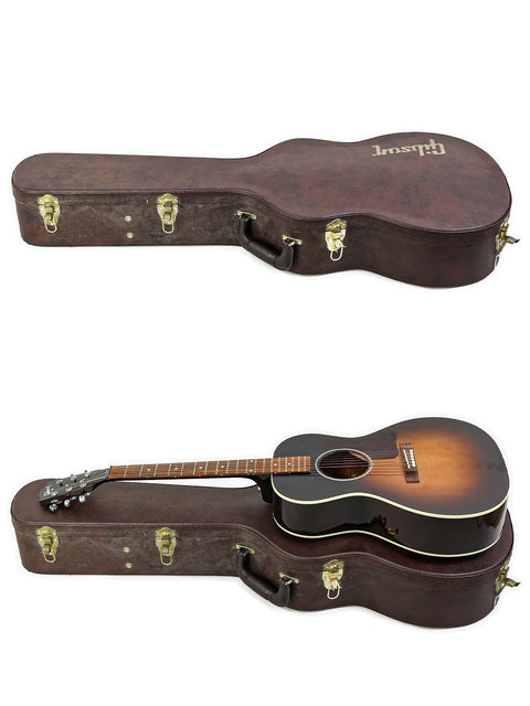 A Gibson L-00 Standard Vintage Sunburst guitar and another guitar nestled in a protective case, highlighting their beauty.