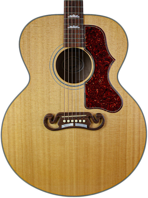 A Gibson SJ-150 acoustic guitar from 2008, showcasing a striking red and black pickguard.