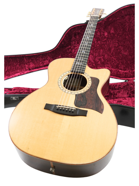 A Lakewood M-NC CP New Century II Grand Concert guitar from Germany, 2004, displayed in its case, emphasizing its beauty.