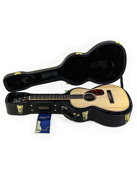A Larrivée 0-40R guitar securely placed in its case, complete with a tag, highlighting its 2016 USA model.
