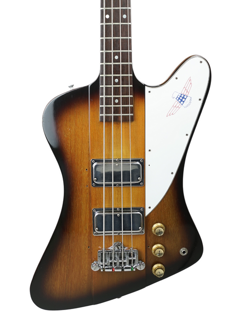 A classic 1976 Gibson Bicentennial Thunderbird IV Bass, highlighting its rich brown body and distinctive white headstock.