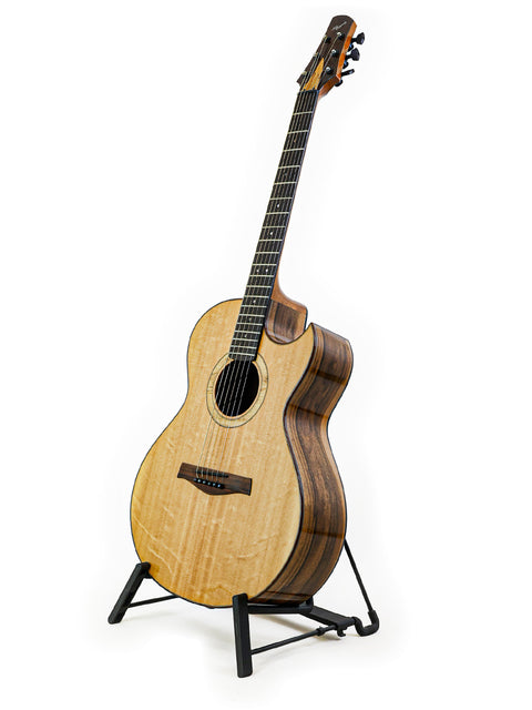 A guitar displayed on a stand with a white backdrop, identified as Gary Rizzolo SJ Custom from Australia, 2013.
