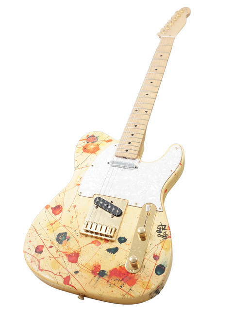 A limited edition 1994 David Hart Guitars Pro Hart Telecaster, flaunting a bold and colorful paint job.
