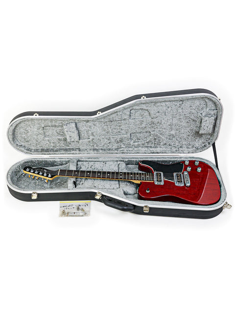 A red Fender Tele-Sonic guitar, model year 2001, resting in its case on a pristine white background.