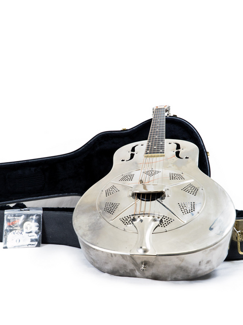 A silver National Resophonic Style N Resonator guitar in its case on the ground, emphasizing its elegant and unique design.