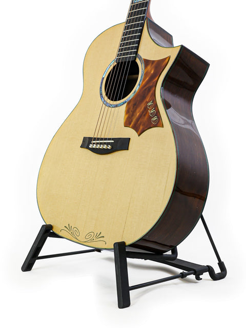 A sleek James Cargill Custom guitar displayed on a stand, set against a minimalist white background, crafted in Australia, 2015.