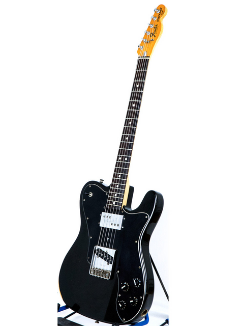 A sleek black 1978 Fender Telecaster Custom guitar featuring a white pickup and a beautiful rosewood fingerboard.