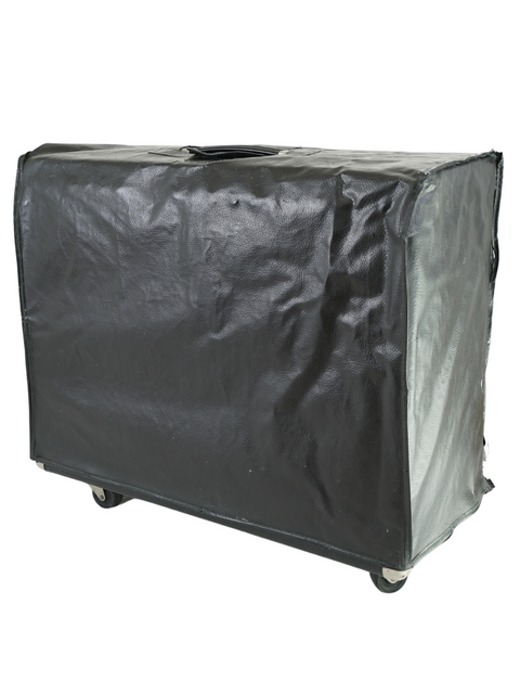 A sleek black suitcase with wheels, contrasting against a white background, combining vintage charm with modern convenience.
