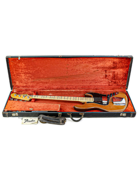 A stunning '59 Fender Jazz Bass guitar, representing vintage craftsmanship and style, crafted in the USA in 1974.