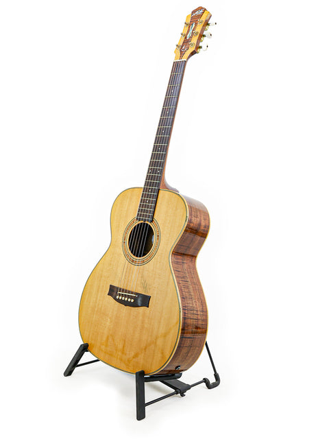 A vintage Matchless Lightning 15 Combo guitar displayed on a stand, with a bright white background highlighting its features.