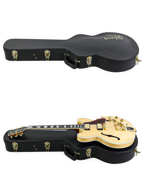 A white background features two guitars, one being a Gibson Custom Shop ES-355, alongside their cases.