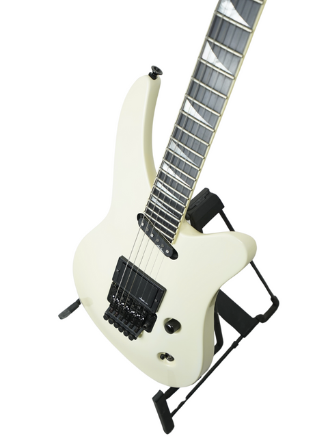 A white electric guitar displayed on a black stand, showcasing the Jackson Phil Collen Signature PC1 Archtop from 1989.
