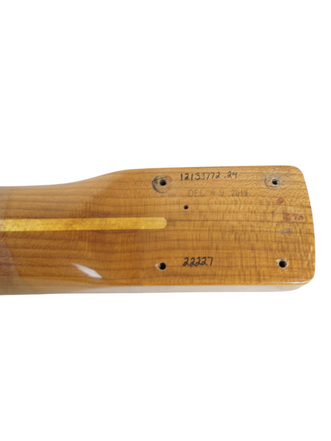 A wooden guitar with a stunning roasted maple neck, representing fine craftsmanship from Fender Custom Shop, USA 2019.