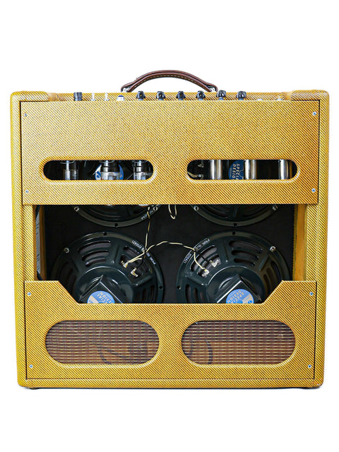 A yellow Victoria 45410-T 'Bassman' amplifier with dual speakers inside, crafted in the USA, year 2007.
