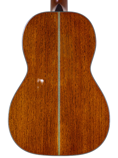 Acoustic guitar back featuring wood grain, part of the Martin Sting Mini Signature Edition, signed by Sting in 2005.