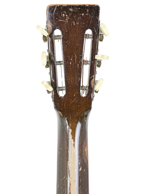 Aerial shot of a 1930s Gibson D-18B-1, highlighting its classic features and vintage appeal.