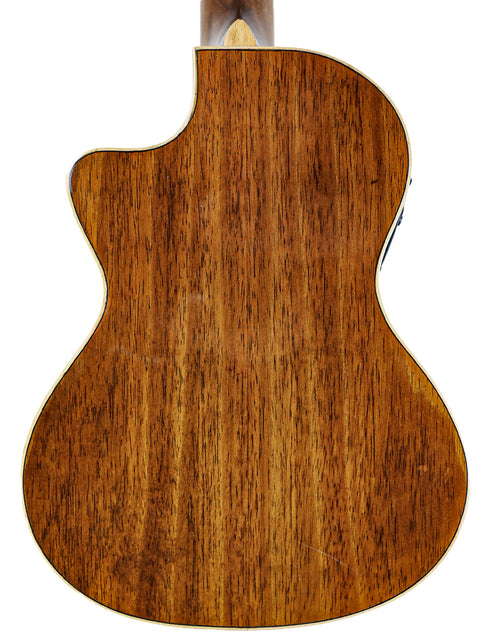 Back view of a Kala KA-KTGE-C Hawaiian Koa Tenor Cutaway Ukulele showcasing its beautiful wooden back.